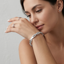 Infinity Twist Silver-Tone Bangle Bracelet – 2.8" Diameter