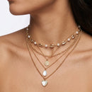 5 separate Necklace with Gold Cowrie Shells & Pearls