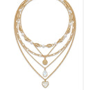 5 separate Necklace with Gold Cowrie Shells & Pearls