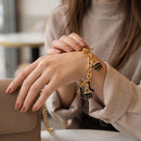 Tazza Women's Gold-Tone Fashion Charm Bracelet with Black Enamel Handbags and High Heel Pumps, Toggle Clasp