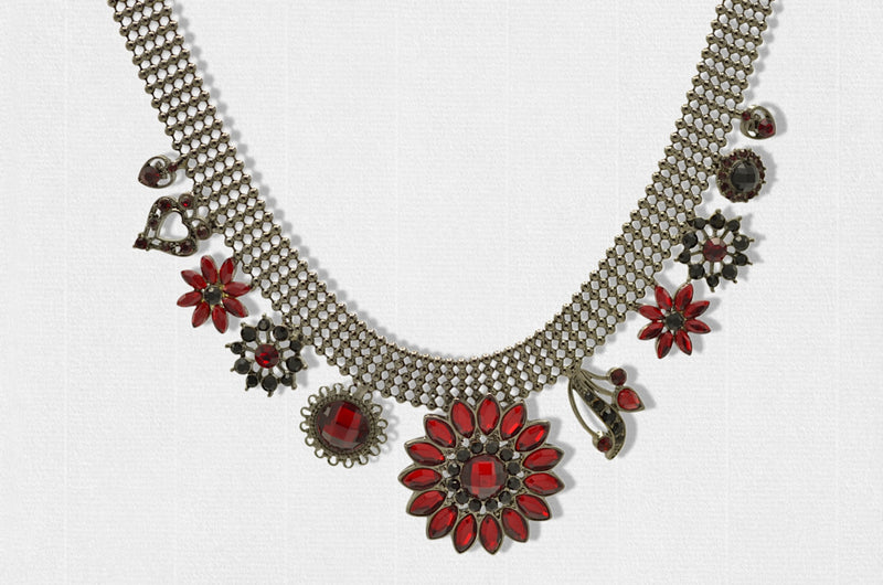 Hematite-Tone Necklace with Red Crystal Flower Charms