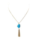 Long gold chain necklace with turquoise stone and gold tassle