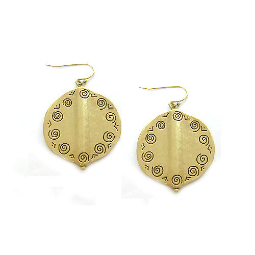 Organic disks of gold tone metal is engraved with the scroll pattern and dropped from fish hooks. The design appreciates the finer points of craftsmanship with modern silhouette. 