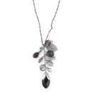 The Bohm 'Autumn Leaves' Glass Bead And Charm Cluster Longer Length Necklace. Oxidized Rhodium Plate And Black Beads. The Beads/Charms Measure 1Cm/10Mm Up To 4.5Cm/45Mm. 'Elongated' Rectangular Links Approx. 3Mm Wide, With Fine Leather Cord Interwoven Thr