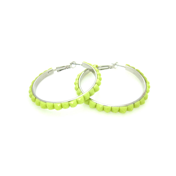 These hoop earrings are absolutely darling. Trimmed with faceted beads that glisten with your every move.