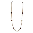 Gold chain with ruby red squares